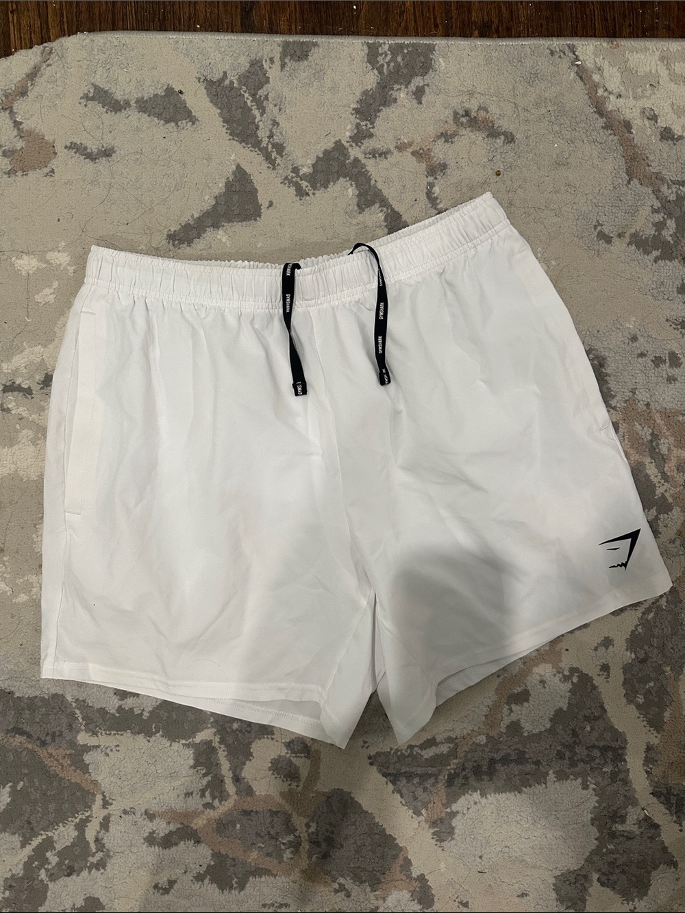 Gymshark Men’s White Athletic Shorts with Black Drawcord